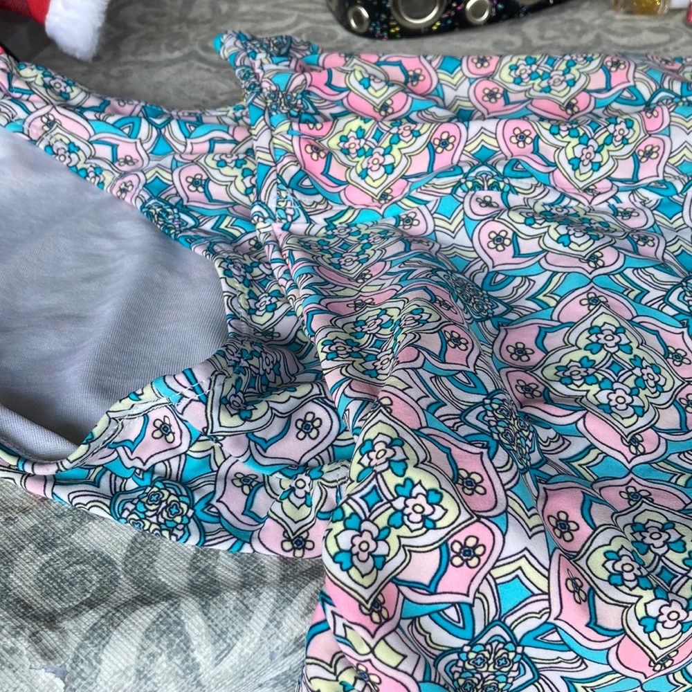 Is a large two pice swimming suit with mandalas
